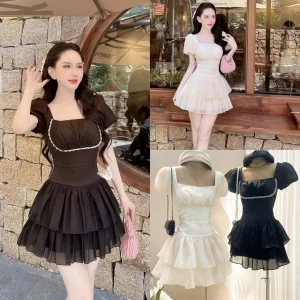 Đầm tơ đính đá ngực 2 màu đen kem Colyn